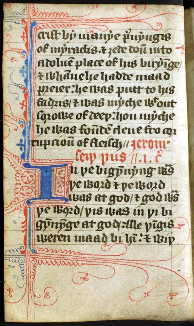 The opening of John's Gospel in a handwritten Wycliffite Bible, Middle English in a gothic book hand with a blue and red decorated initial.
